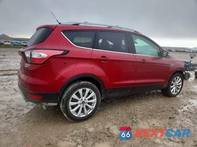 Trzecie zdjęcie samochodu z tyłu: 2018 FORD ESCAPE TITANIUM VIN:1FMCU9J9XJUC62116 - miniatura