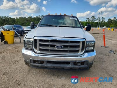 Piąte zdjęcie samochodu w środku: 1999 FORD F250 SUPER DUTY VIN:1FTNW20L8XEA96113 - miniatura