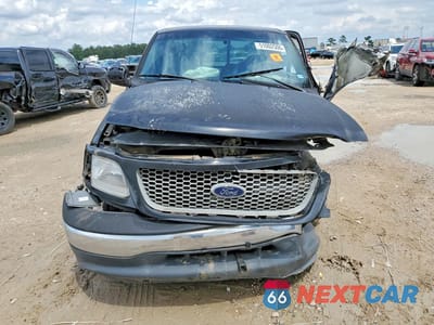 Piąte zdjęcie samochodu w środku: 1999 FORD F150 VIN:1FTRX07L2XKA58693 - miniatura