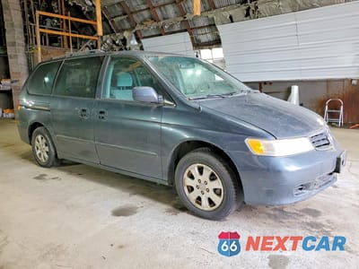 Czwarte zdjęcie samochodu z boku: 2003 HONDA ODYSSEY EX VIN:5FNRL18603B143615 - miniatura