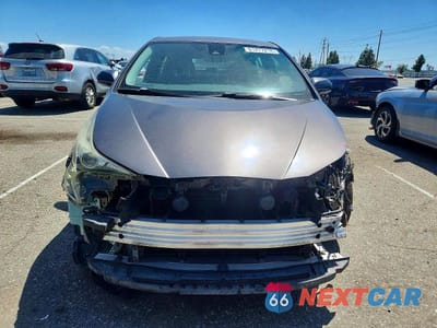 Piąte zdjęcie samochodu w środku: 2018 TOYOTA PRIUS TWO VIN:JTDKBRFUXJ3585851 - miniatura