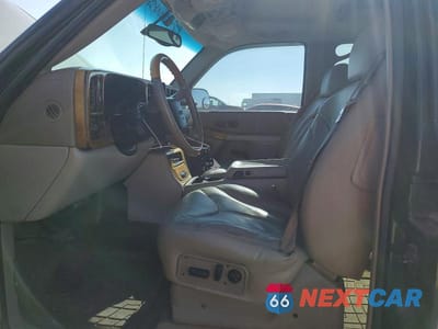 Zdjęcie 7 z 13 samochodu: 2002 GMC YUKON XL C1500 VIN:1GKEC16Z72J147488 - miniatura