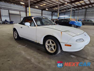Czwarte zdjęcie samochodu z boku: 1996 MAZDA MX-5 MIATA VIN:JM1NA3530T0707062 - miniatura