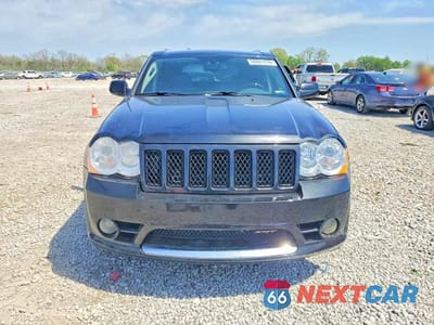 Piąte zdjęcie samochodu w środku: 2009 JEEP GRAND CHEROKEE SRT-8 VIN:1J8HR78W19C542318 - miniatura