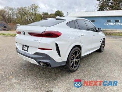 Czwarte zdjęcie samochodu z boku: 2023 BMW X6 XDRIVE40I VIN:5UXCY6C05P9P51197 - miniatura
