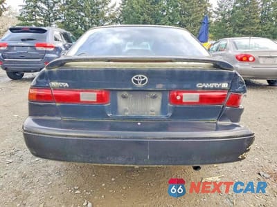 Zdjęcie 7 z 13 samochodu: 1997 TOYOTA CAMRY LE VIN:JT2BG22K0V0066191 - miniatura