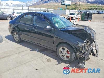 Czwarte zdjęcie samochodu z boku: 2004 KIA SPECTRA LX VIN:KNAFE121045018995 - miniatura