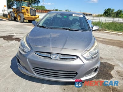 Piąte zdjęcie samochodu w środku: 2015 HYUNDAI ACCENT GLS VIN:KMHCT4AEXFU901508 - miniatura