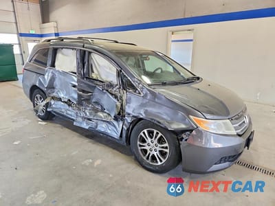 Czwarte zdjęcie samochodu z boku: 2012 HONDA ODYSSEY VIN:5FNRL5H49CB114717 - miniatura