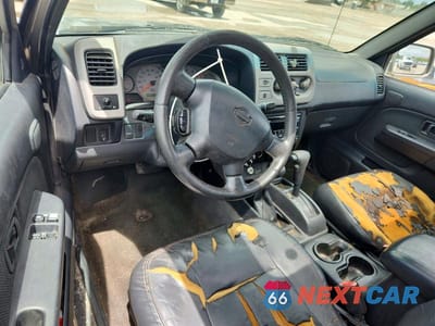 Zdjęcie 8 z 11 samochodu: 2001 NISSAN FRONTIER SC VIN:1N6MD26Y01C369713 - miniatura