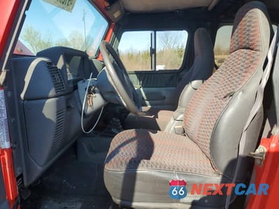 Zdjęcie 7 z 12 samochodu: 1999 JEEP WRANGLER / TJ SE VIN:1J4FY29P6XP446941 - miniatura