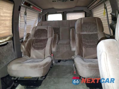 Zdjęcie 10 z 14 samochodu: 2002 FORD ECONOLINE E150 VAN VIN:1FDRE14L12HA10880 - miniatura