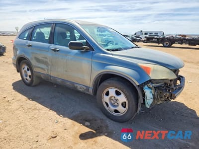 Czwarte zdjęcie samochodu z boku: 2010 HONDA CR-V LX VIN:5J6RE3H32AL041636 - miniatura