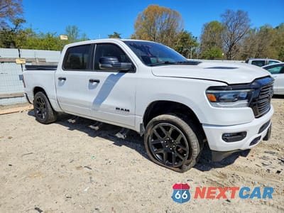 Czwarte zdjęcie samochodu z boku: 2023 RAM 1500 LARAMIE VIN:1C6SRFJT3PN542644 - miniatura