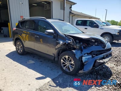 Czwarte zdjęcie samochodu z boku: 2017 TOYOTA RAV4 HYBRID XLE VIN:JTMRJREV7HD062934 - miniatura