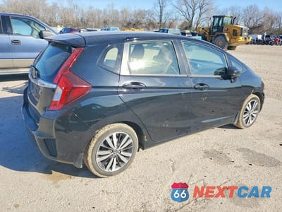 Trzecie zdjęcie samochodu z tyłu: 2016 HONDA FIT EX VIN:JHMGK5H77GX024755 - miniatura