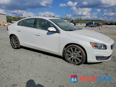 Czwarte zdjęcie samochodu z boku: 2016 VOLVO S60 PLATINUM VIN:LYV612TM8GB102175 - miniatura