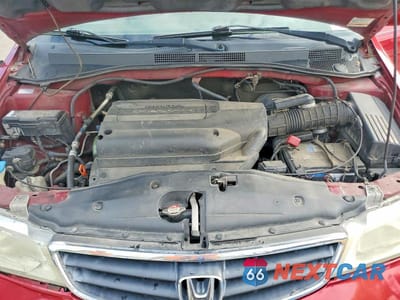 Zdjęcie 12 z 13 samochodu: 2004 HONDA ODYSSEY EXL VIN:5FNRL18704B143656 - miniatura