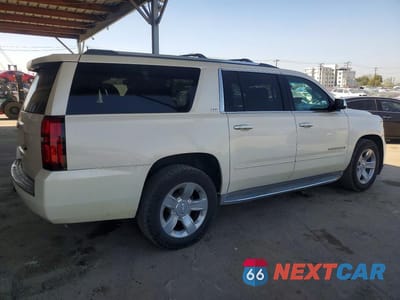 Trzecie zdjęcie samochodu z tyłu: 2015 CHEVROLET SUBURBAN C1500 LTZ VIN:1GNSCKKC4FR145881 - miniatura
