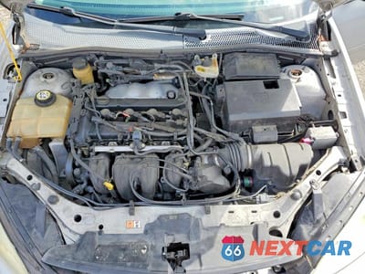 Zdjęcie 11 z 13 samochodu: 2005 FORD FOCUS ZX4 VIN:1FAFP34N15W238270 - miniatura