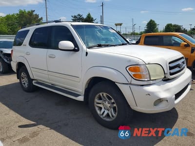 Czwarte zdjęcie samochodu z boku: 2004 TOYOTA SEQUOIA LIMITED VIN:5TDBT48A94S221135 - miniatura