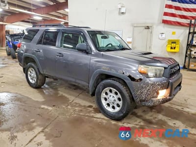 Czwarte zdjęcie samochodu z boku: 2010 TOYOTA 4RUNNER SR5 VIN:JTEBU5JR0A5004914 - miniatura