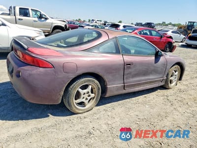 Trzecie zdjęcie samochodu z tyłu: 1997 MITSUBISHI ECLIPSE GS VIN:4A3AK44Y9VE056709 - miniatura