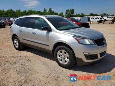 Czwarte zdjęcie samochodu z boku: 2014 CHEVROLET TRAVERSE LS VIN:1GNKRFED6EJ351730 - miniatura
