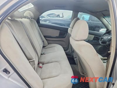 Zdjęcie 10 z 12 samochodu: 2006 KIA SPECTRA EX VIN:KNAFE121X65284124 - miniatura
