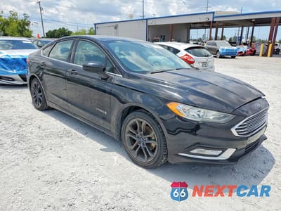Czwarte zdjęcie samochodu z boku: 2018 FORD FUSION SE HYBRID VIN:3FA6P0LU9JR123999 - miniatura