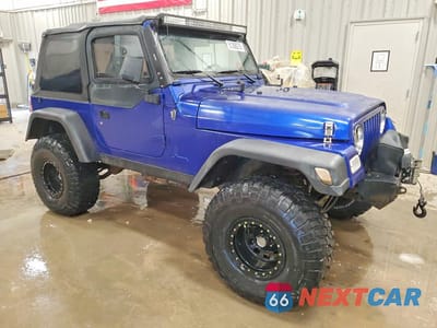 Czwarte zdjęcie samochodu z boku: 1997 JEEP WRANGLER / TJ SE VIN:1J4FY29P5VP508598 - miniatura