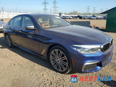 Czwarte zdjęcie samochodu z boku: 2018 BMW M550XI VIN:WBAJB9C5XJG464364 - miniatura