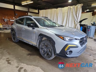 Czwarte zdjęcie samochodu z boku: 2024 SUBARU CROSSTREK SPORT VIN:4S4GUHF63R3705573 - miniatura