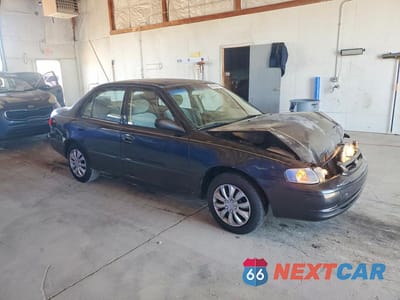 Czwarte zdjęcie samochodu z boku: 2000 TOYOTA COROLLA VE VIN:1NXBR12E8YZ316453 - miniatura