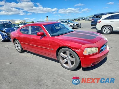 Czwarte zdjęcie samochodu z boku: 2006 DODGE CHARGER R VIN:2B3KA53H16H533677 - miniatura