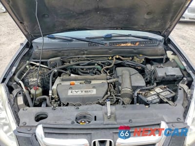 Zdjęcie 12 z 13 samochodu: 2005 HONDA CR-V LX VIN:JHLRD68535C015289 - miniatura