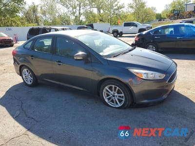 Czwarte zdjęcie samochodu z boku: 2016 FORD FOCUS SE VIN:1FADP3F2XGL382494 - miniatura