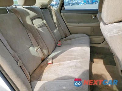 Zdjęcie 10 z 13 samochodu: 2003 TOYOTA AVALON XL VIN:4T1BF28B13U273935 - miniatura