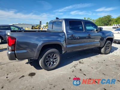 Trzecie zdjęcie samochodu z tyłu: 2023 TOYOTA TACOMA SR5 V6 VIN:3TMCZ5AN2PM599517 - miniatura