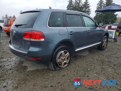 Trzecie zdjęcie samochodu z tyłu: 2006 VOLKSWAGEN TOUAREG 3.2 VIN:WVGZG77L76D024482 - miniatura