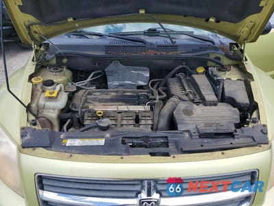 Zdjęcie 11 z 12 samochodu: 2010 DODGE CALIBER MAINSTREET VIN:1B3CB3HA9AD568099 - miniatura