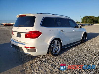 Trzecie zdjęcie samochodu z tyłu: 2015 MERCEDES-BENZ GL 550 4MATIC VIN:4JGDF7DE2FA577321 - miniatura