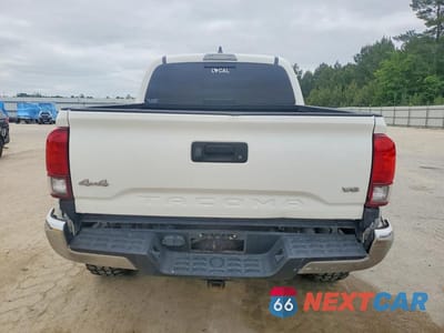 Zdjęcie 6 z 12 samochodu: 2021 TOYOTA TACOMA SR5 V6 VIN:3TMCZ5AN1MM411484 - miniatura