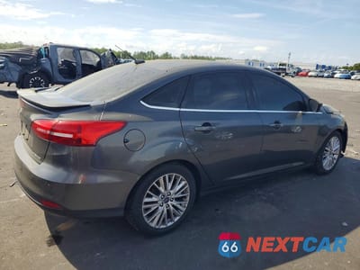 Trzecie zdjęcie samochodu z tyłu: 2017 FORD FOCUS TITANIUM VIN:1FADP3J29HL281696 - miniatura