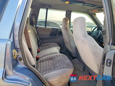 Zdjęcie 11 z 14 samochodu: 1995 JEEP GRAND CHEROKEE LAREDO VIN:1J4GZ58S3SC581352 - miniatura