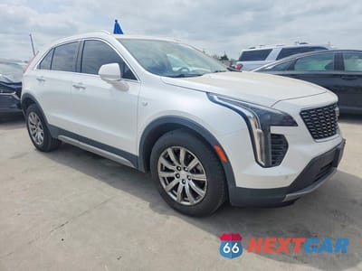 Czwarte zdjęcie samochodu z boku: 2019 CADILLAC XT4 PREMIUM LUXURY VIN:1GYFZCR44KF211736 - miniatura