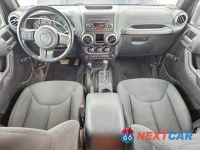 Zdjęcie 8 z 12 samochodu: 2016 JEEP WRANGLER UNLIMITED SPORT VIN:1C4BJWDG7GL103053 - miniatura