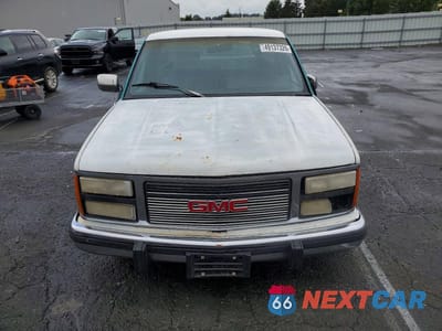 Piąte zdjęcie samochodu w środku: 1990 GMC SIERRA C1500 VIN:1GTDC14K6LZ552872 - miniatura