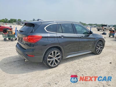 Trzecie zdjęcie samochodu z tyłu: 2017 BMW X1 XDRIVE28I VIN:WBXHT3C35H5F75779 - miniatura