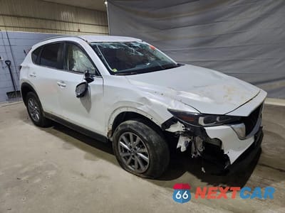 Czwarte zdjęcie samochodu z boku: 2023 MAZDA CX-5 SELECT VIN:JM3KFBBM9P0152590 - miniatura
